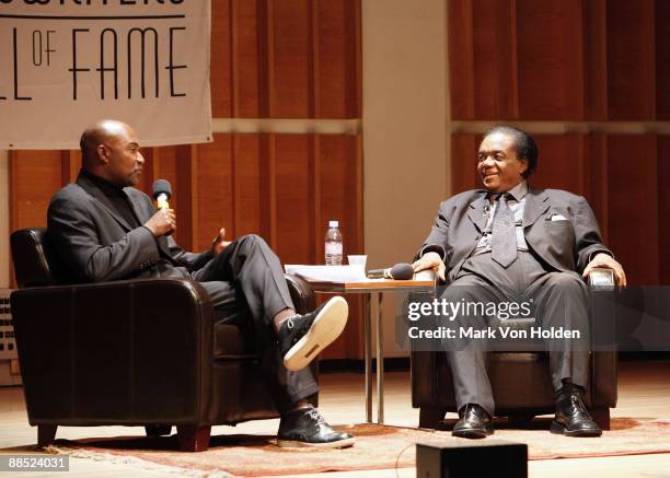Author and host Nelson George speaks with honoree and musical artist Lamont Dozier at the 3rd annual Songwriters Hall of Fame Master Class at the...