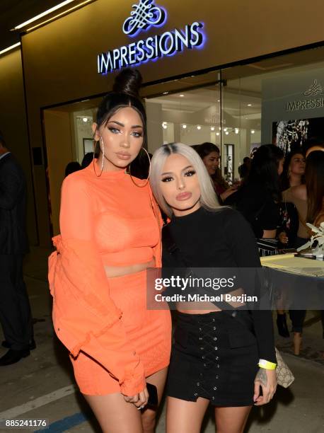 Melly Sanchez and Isabel Bedoya attend #MelroseIsLit: Impressions Vanity Melrose Grand Opening Gala on December 2, 2017 in Los Angeles, California.