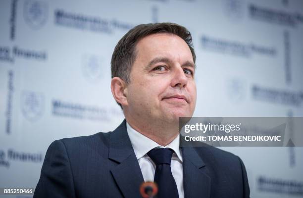 Picture taken on February 15, 2016 shows Slovak Finance Minister Peter Kazimir during a press conference in Bratislava. Peter Kazimir has put forward...