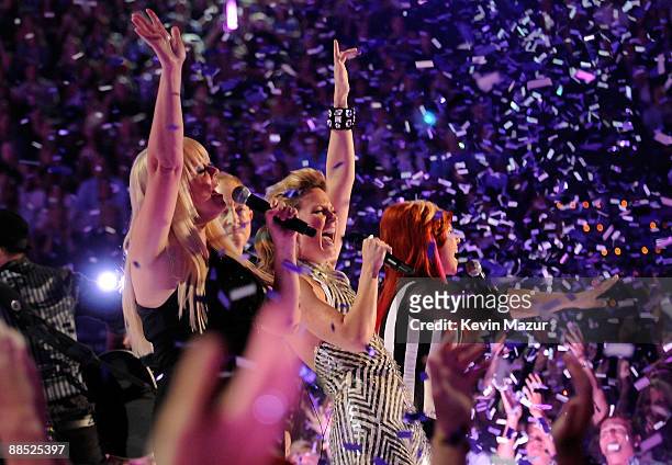 Kate Pierson of the B-52's, Jennifer Nettles of Sugarland and Cindy Wilson of the b-52's perform 'Love Shack' on stage at the 2009 CMT Music Awards...