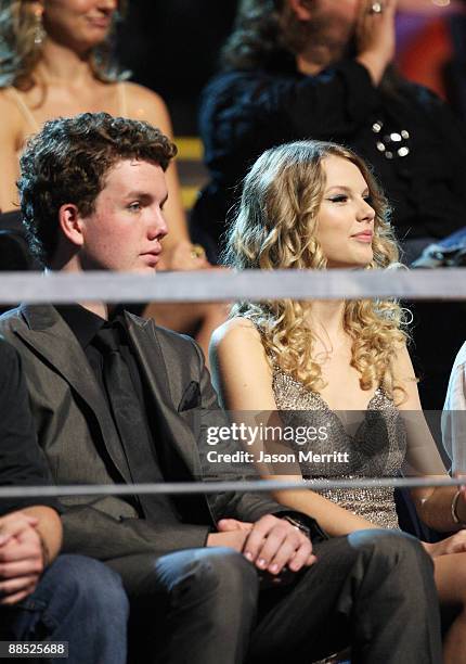 Singer/musician Taylor Swift and brother Austin Swift attend the 2009 CMT Music Awards at the Sommet Center on June 16, 2009 in Nashville, Tennessee.