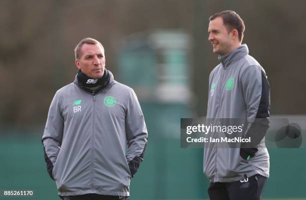 Brendan Rodgers, coach of Celtic and assistant Chris Davies look on during a Celtic training session on the eve of their UEFA Champions League match...