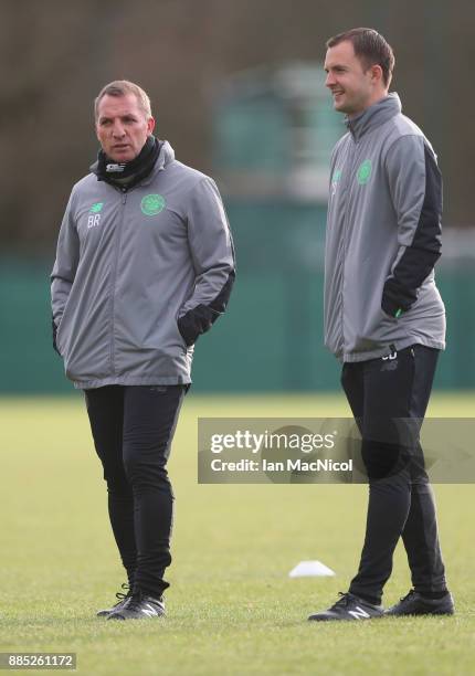 Brendan Rodgers, coach of Celtic and assistant Chris Davies look on during a Celtic training session on the eve of their UEFA Champions League match...