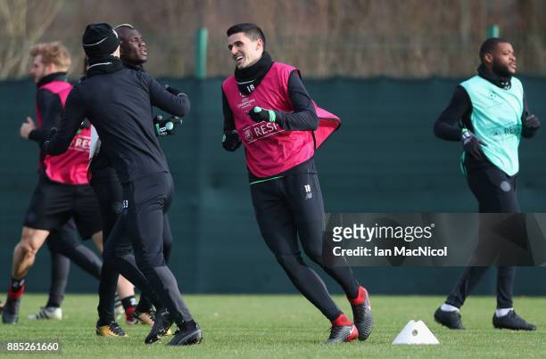Tom Rogic warms up with team mates during a Celtic training session on the eve of their UEFA Champions League match against Anderlecht at Lennoxtown...