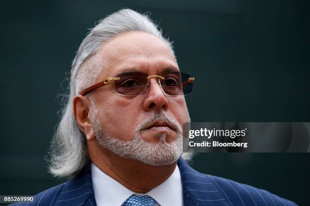 Vijay Mallya, founder and chairman of Kingfisher Airlines Ltd., stands outside Westminster Magistrates' Court after it was evacuated in London, U.K.,...