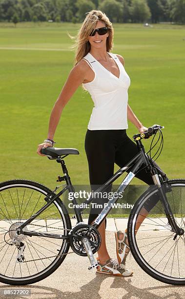 Elle Macpherson attends a photocall to launch Skyride, a summer of free cycling events in Regents Park on June 17, 2009 in London, England.