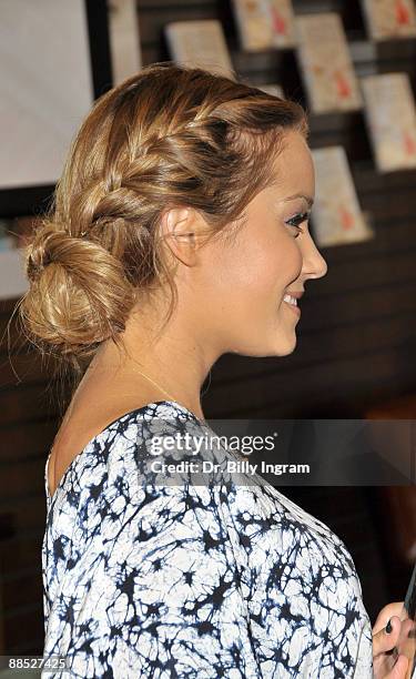 Actress Lauren Conrad signs copies of her new book "L.A. Candy" at the Barnes & Noble bookstore at The Grove on June 16, 2009 in Los Angeles,...