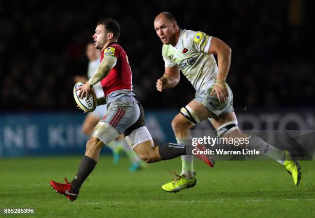 Danny Care of Harlequins is tacked by Schalk Burger of Saracens during the Aviva Premiership match between Harlequins and Saracens at Twickenham...