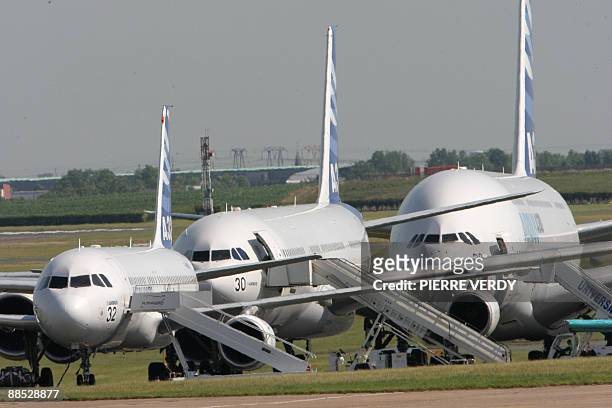 The Airbus A320, A340 and A380 line up on the tarmac on June 17, 2009 at the 48th international Paris Air Show at Le Bourget airport prior a special...