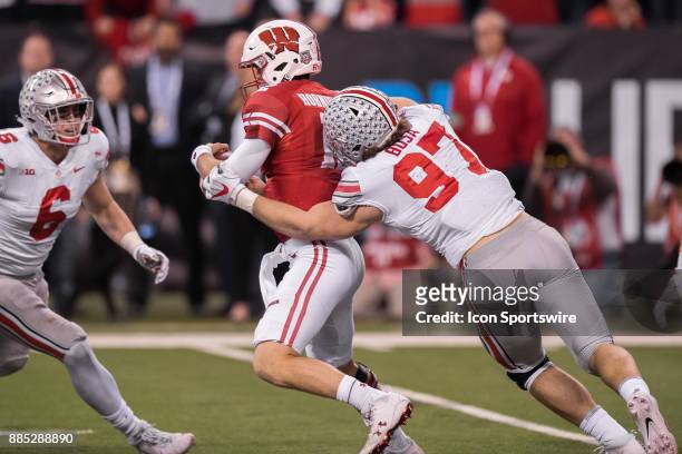 Ohio State Buckeyes defensive lineman Nick Bosa sacks Wisconsin Badgers quarterback Alex Hornibrook during the Big 10 Championship game between the...