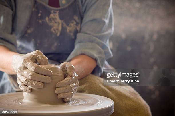 active senior woman making pottery - pottery wheel stock pictures, royalty-free photos & images