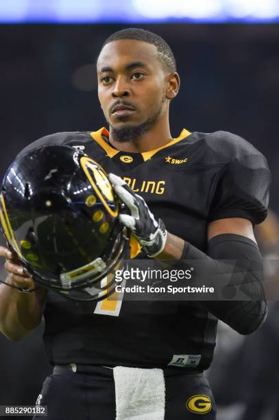 Grambling State Tigers quarterback Devante Kincade warms up before the second half during the SWAC Championship football game between the Alcorn...