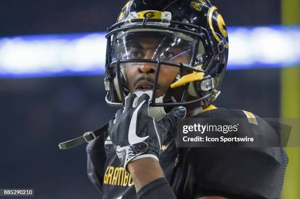 Grambling State Tigers quarterback Devante Kincade warms up before the second half during the SWAC Championship football game between the Alcorn...