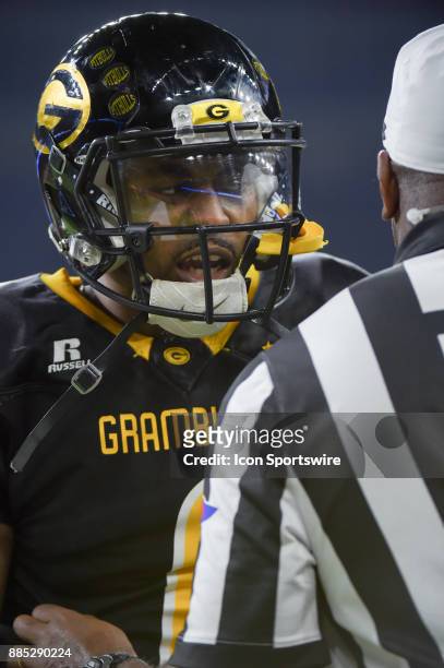 Grambling State Tigers quarterback Devante Kincade talks to the referee near the sideline during the SWAC Championship football game between the...