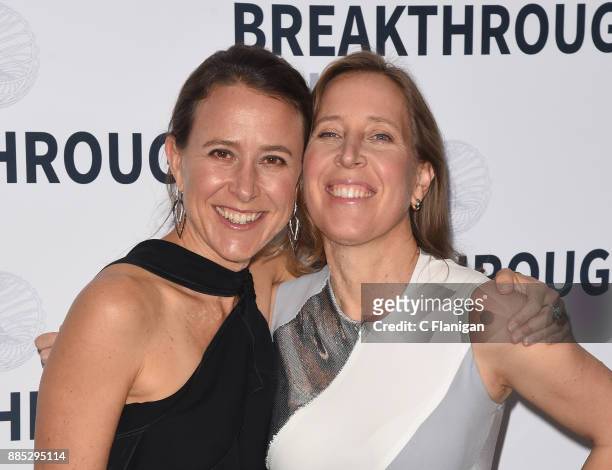 CEOs and sisters Anne Wojcicki and Susan Wojcicki pose backstage during the 2018 Breakthrough Prize at NASA Ames Research Center on December 3, 2017...