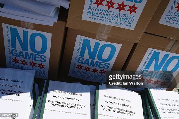 Boxes of 'No Games Chicago' campaign leaflets, are laid out by protestor Tom Tresser outside the Olympic Museum while the Chicago 2016 Olympic team...