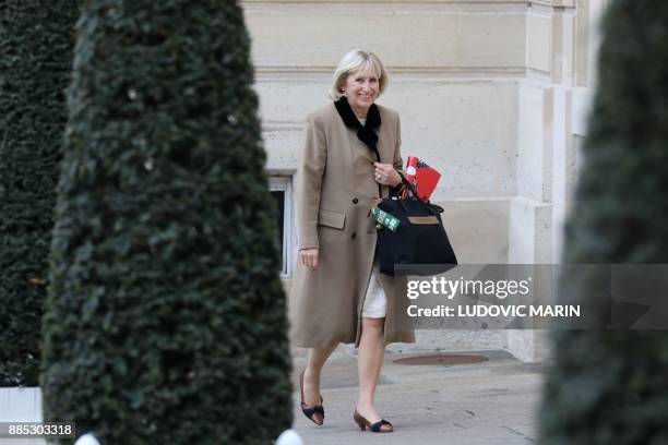 Former press organization manager for French president, Evelyne Richard, arrives for a ceremony at the Elysee palace on december 4 in Paris. / AFP...