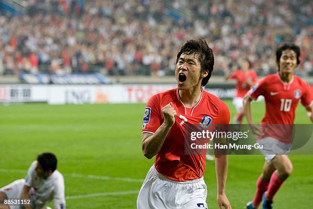 Manchester United's Korean midfielder Park Ji-Sung of South Korea reels off celebrating a goal scored during the 2010 FIFA World Cup Asian Qualifiers...