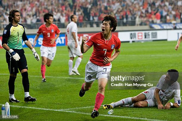 Manchester United's Korean midfielder Park Ji-Sung of South Korea reels off celebrating a goal scored during the 2010 FIFA World Cup Asian Qualifiers...
