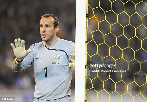 Australian goalkeeper Mark Schwarzer sets up his defence during the 2010 FIFA World Cup Asian qualifying match between the Australian Socceroos and...