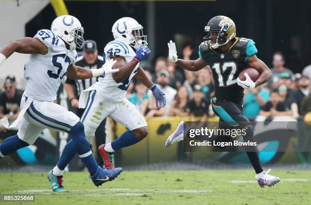 Dede Westbrook of the Jacksonville Jaguars runs with the football in the second half of their game against the Indianapolis Colts at EverBank Field...