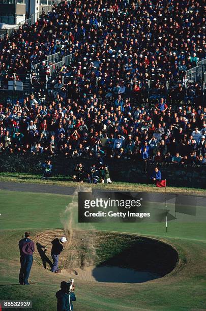 Costantino Rocca of Italy plays out of the bunker on the 17th hole during the British Open Golf Championship 1995 on July 23, 1995 at the Royal and...
