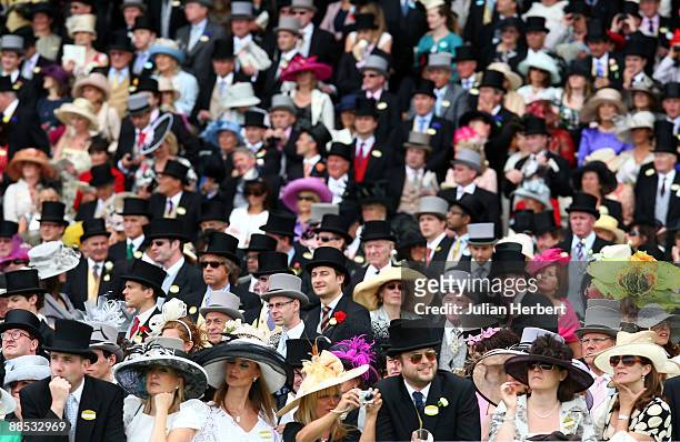 Racegoers watch The Windsor Forest Stakes Race run on The 2nd Day of The Royal Meeting at Ascot Racecourse on June 17, 2009 in Ascot, England.