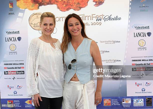 Aimee Mullins and Stefania Orsola Garrello attend photocall at the Palazzo Dei Congressi during the 2009 Taormina Film Fest on June 17, 2009 in...