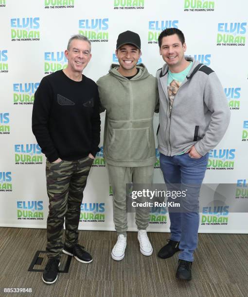 Elvis Duran, Jake Miller and Alex Carr pose for a photo at "The Elvis Duran Z100 Morning Show" at Z100 Studio on December 4, 2017 in New York City.