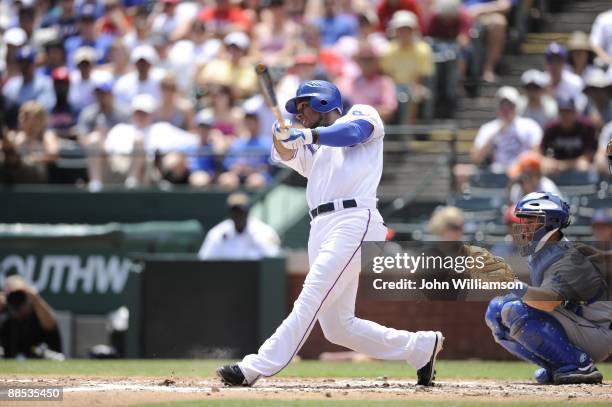 Elvis Andrus of the Texas Rangers bats during the game against the Los Angeles Dodgers at Rangers Ballpark in Arlington in Arlington, Texas on...