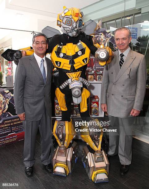 Hasbro Mexico General Director Carlos Salame Samano, Transformer Bumblebee and Liverpool public relations manager Eduardo Mallet attends the...