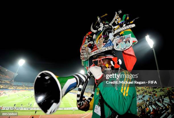 South Africa fan poses in the stadium prior to the Group A FIFA Confederations Cup match between the South Africa and New Zealand at the Royal...