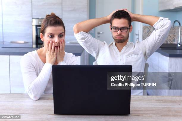 france, young couple in their new house. - teleurstelling stockfoto's en -beelden