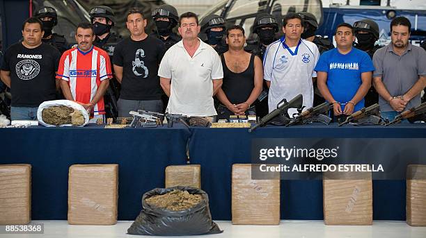 The members of the drug cartel "La Familia Michoacana" are presented to the press at the police command centre in Mexico City on June 17, 2009. The...