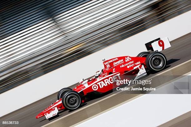 Scott Dixon, driver of the Target Chip Ganassi Dallara Honda, competes in the Indy 500 Pit Stop Challenge during Miller Lite Carb Day practice for...