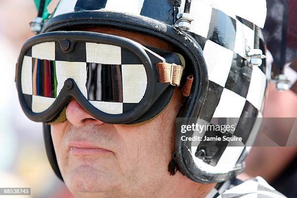 Race fan watches the action during Miller Lite Carb Day practice for the IRL IndyCar Series 93rd running of the Indianapolis 500 on May 22, 2009 at...