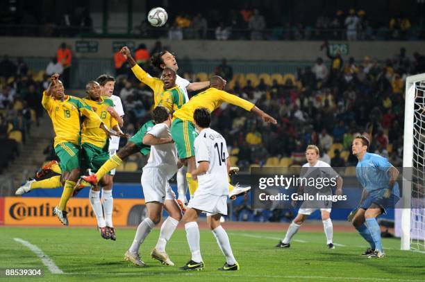 South Africa and New Zealand players in action during the FIFA Confederations Cup match between South Africa and New Zealand at Royal Bafokeng...