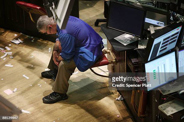 Trader works on the floor of the New York Stock Exchange on June 17, 2009 in New York, New York. The markets finished flat Wednesday with The Dow...