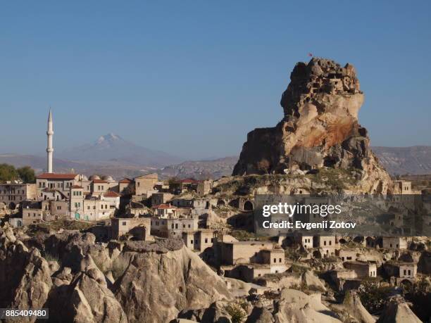 ortahisar village with mount erciyes on background, cappadocia, turkey - ortahisar stock pictures, royalty-free photos & images