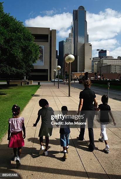 Homeless children are led to a soup kitchen for lunch on June 17, 2009 in Dallas, Texas. The National Center on Family Homelessness reported this...