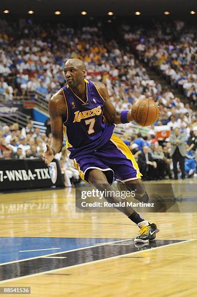 Lamar Odom of the Los Angeles Lakers moves the ball against the Orlando Magic in Game Five of the 2009 NBA Finals on June 14, 2009 at Amway Arena in...