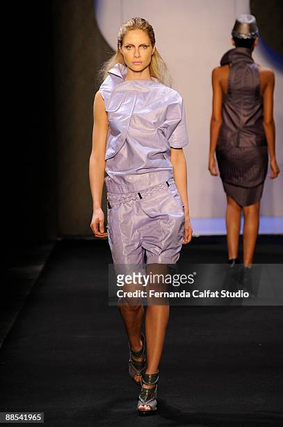 Model Ana Claudia Michels displays a design by Priscilla Darolt during the first day of Sao Paulo Fashion Week Spring-Summer 2010 collection at the...