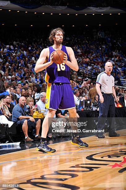 Pau Gasol of the Los Angeles Lakers looks to pass the ball against the Orlando Magic in Game Three of the 2009 NBA Finals at Amway Arena on June 9,...