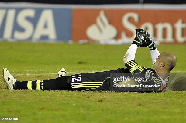 Goalkeeper Marcos of Brazil's Palmeiras in lament after losing the match against Uruguay's Nacional on the quarter final round of the Santander...