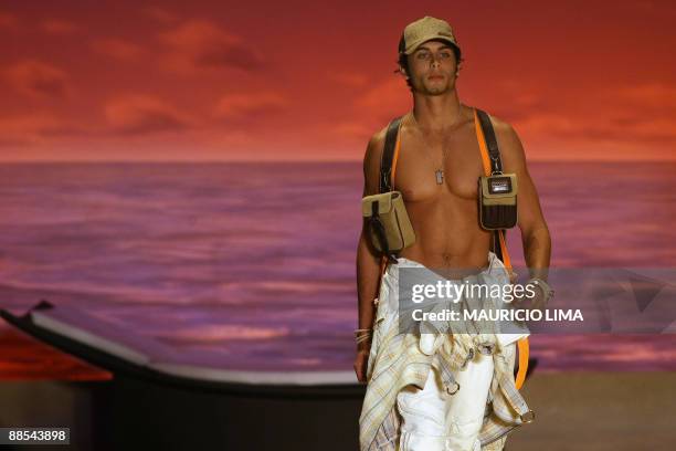 Brazilian model Jesus Luz presents a creation by Colcci during the opening day of the 2009-2010 Spring-Summer collections of the Sao Paulo Fashion...