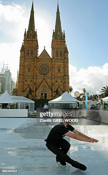 Callum Bullard 15-years, the Australian Intermediate men's Hollins ice skating champion, tries out an open air ice-skating rink erected on the...