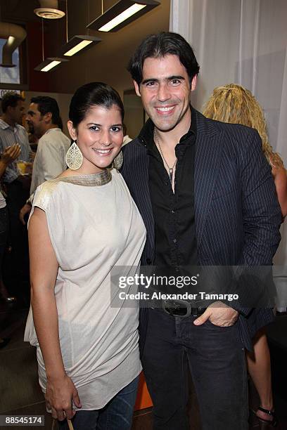 Dominique Bonnelly and Jose Guillermo Cortines attend the Rocco Donna Coral Gables Salon grand opening on June 17, 2009 in Coral Gables, Florida.