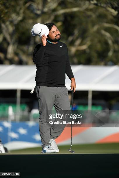 Spaun acknowledges the gallery on the 18th hole during the final round of The RSM Classic at the Sea Island Resort Seaside Course on November 19,...