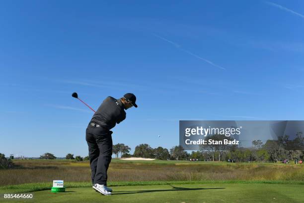 Austin Cook plays a shot on the fourth hole during the final round of The RSM Classic at the Sea Island Resort Seaside Course on November 19, 2017 in...