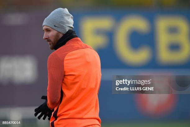 Barcelona's Argentinian forward Lionel Messi arrives for a training session at the Sports Center FC Barcelona Joan Gamper in Sant Joan Despi, on...